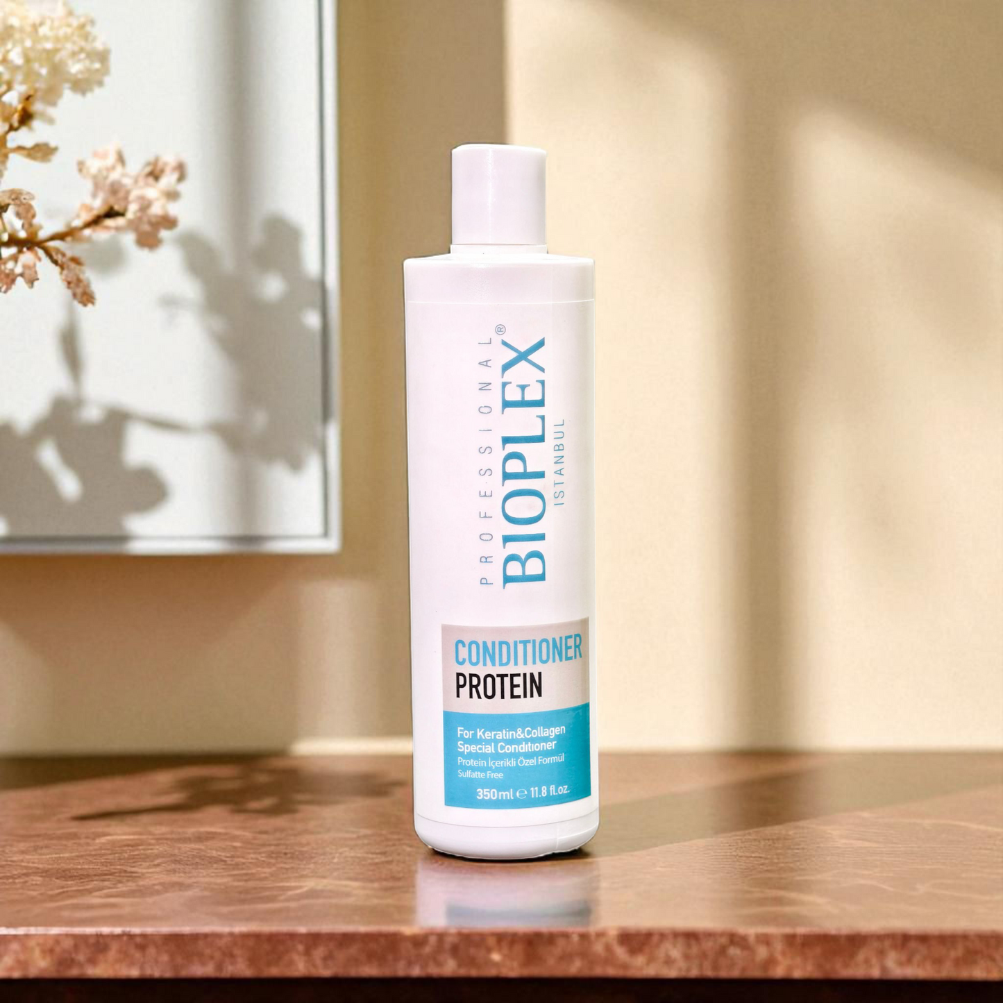 Bioplex Protein Conditioner bottle on a wooden surface with a neutral background