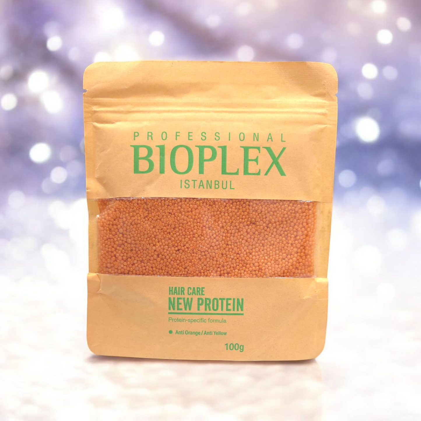 Close-up of Bioplex golden protein balls for hair repair and anti-breakage